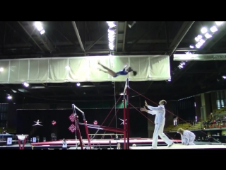 the coach successfully secured the gymnast who flew off the crossbar head down