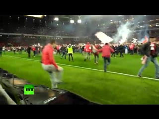 thousands of spartak fans ran onto the field after the match {05/17/2017}